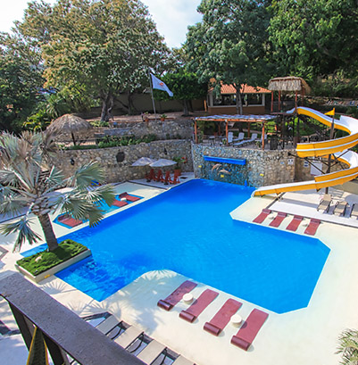 hotel binniguenda huatulco alberca camastro asoleadero